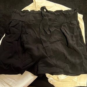 Size small black fabric shorts with front tie